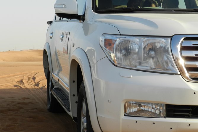 Morning Red Dunes Desert Safari With Camel Ride And Sand Boarding - Booking Details