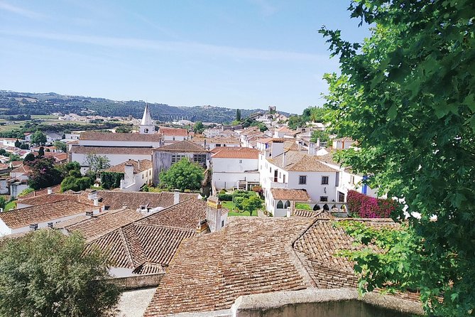 Peniche, Nazaré (Big Waves), Batalha Monastery Tour, and Óbidos - Cultural Experiences and Local Traditions