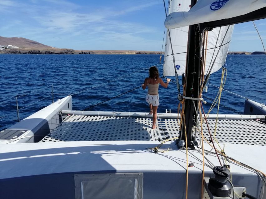 Playa Blanca: Private Catamaran Tour With SUP and Snorkeling - Experience Highlights and Exploration Opportunities