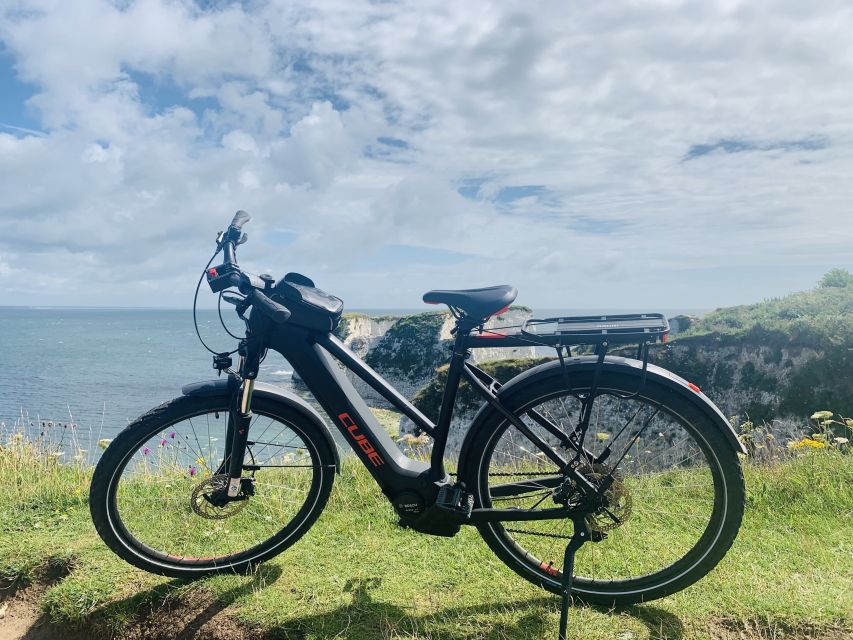 Poole: Old Harry Rocks and Corfé Castle Guided E-bike Tour - Price and Inclusions