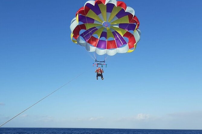 San Miguel De Cozumel Parasailing Experience With Beach Break - Logistics and Restrictions