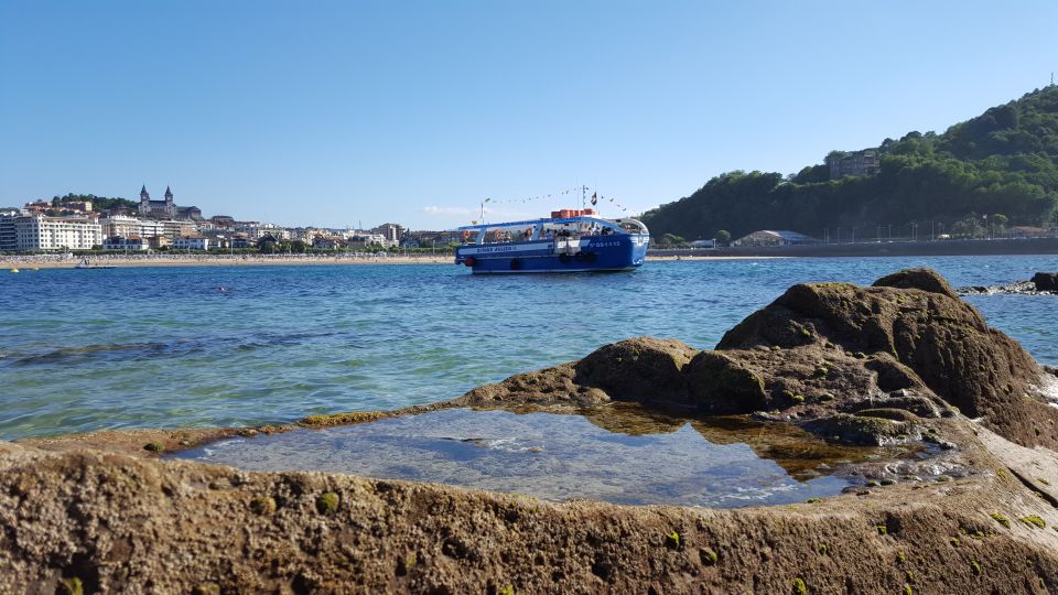 San Sebastian: Boat Tour With Stop at Santa Clara - Inclusions and Restrictions