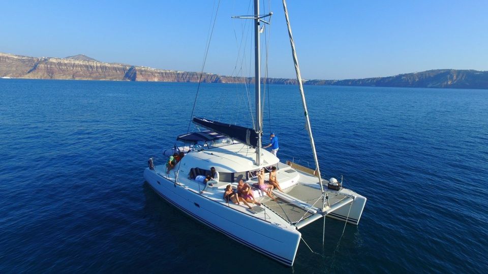 Santorini: 7-Hour Private Catamaran Cruise With Food & Drink - Important Information and Price