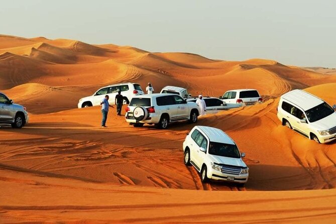 Dubai Desert Safari With Live Show, BBQ Dinner, Camel Ride & Sand Board Options - Pricing and Booking Details