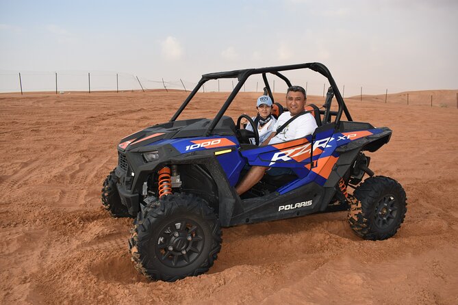 Dune Buggy Polaris RZR 1000cc Sandboarding and Camel Ride Dubai - Common questions