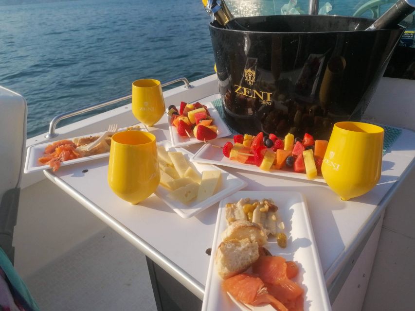 Garda: Half Day Boat Cruise With Fish and Wine Tasting - Restrictions and Booking Details