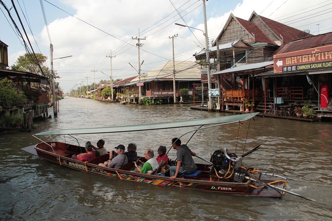 Half Day Tour to Explore Damnoen Saduak Floating Market - Local Delicacies