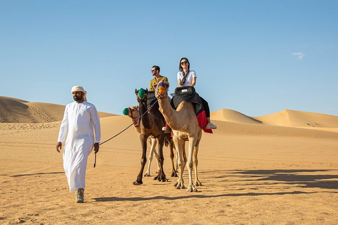 Morning Camel Trekking With Dune Bashing and Sand Boarding - Pricing and Reviews