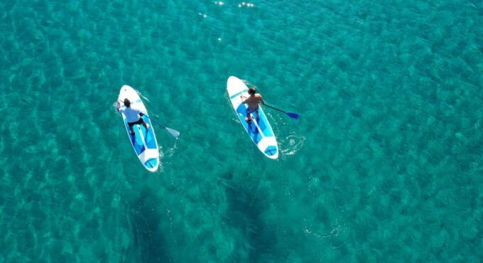 Paros: Private Catamaran Cruise With Meal, Drinks & SUP - Background