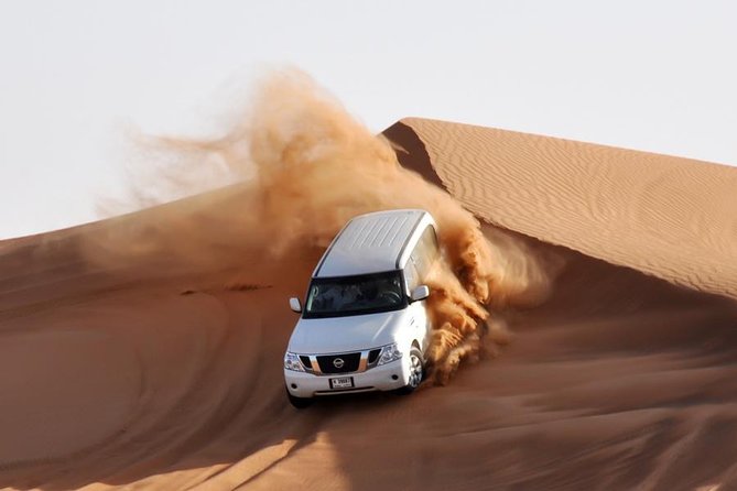 Red Dunes Safari With Half Hrs Quad Bike Ride & Half Day Dubai City Tour - Pricing and Important Details