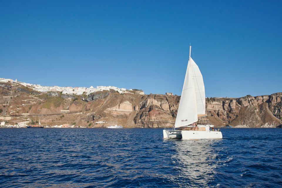 Santorini: Catamaran Day Trip With Snorkel, Meal, & Open Bar - Activity Overview
