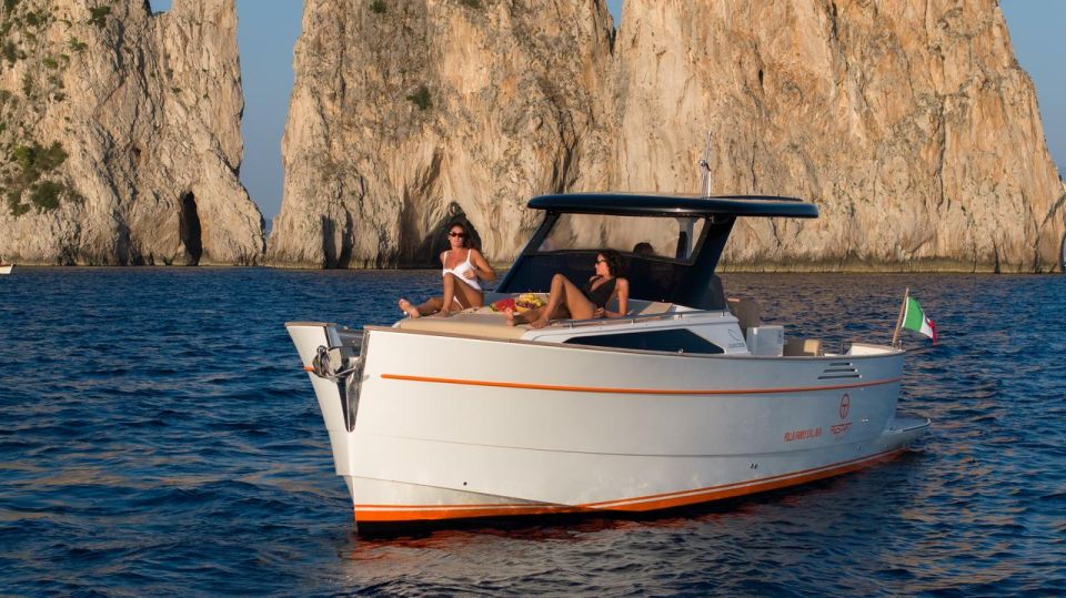 Sorrento: Private Tour to Capri on a  Gozzo Boat - Background