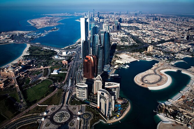 Dubai to Abu Dhabi City Tour With Ferrari World Admission Ticket - Pricing and Guarantee Information