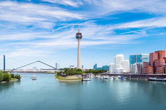 Dusseldorf: Walking Tour With Audio Guide on App - Contact and Booking Details