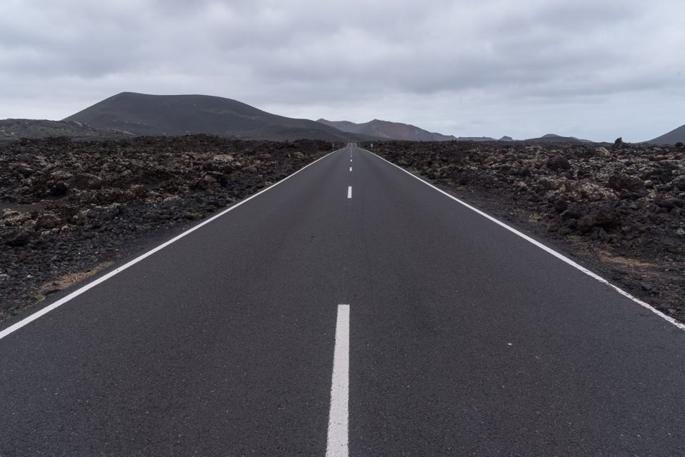 From Fuerteventura: Lanzarote Volcano and Wine Region Tour - Wine Tasting Experience and Lagoon Visit