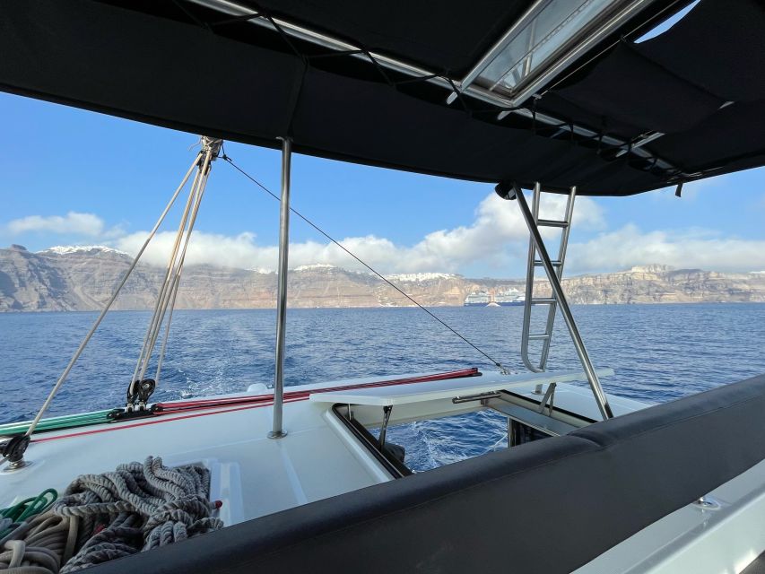 Santorini Catamaran Cruise With Swimming, Meal and Open Bar - Price and Duration