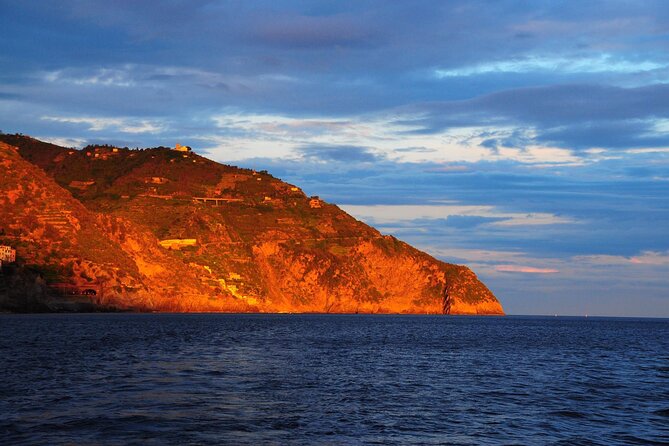 Cinque Terre Sunset Boat Tour on a Traditional Wooden Gozzo - Booking Information and Tips