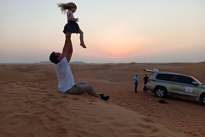 Dubai Red Dunes Morning Safari With Camel Ride - Sandboarding on Sand Dunes