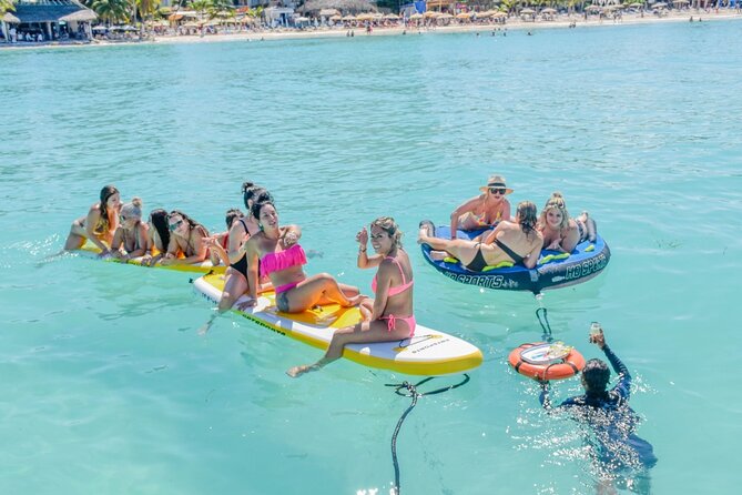 Isla Mujeres Catamaran Tour With Snorkel, Open Bar and Transport - Transport and Pickup Details