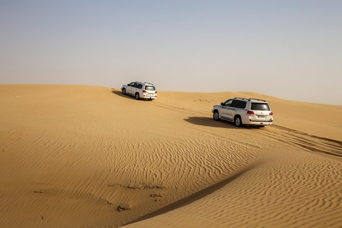 Morning Desert Safari With Sand Boarding & Camel Ridetour - Enjoyable Activities and Experiences
