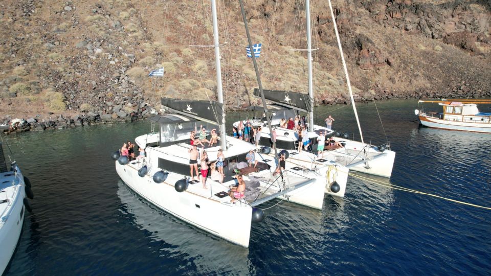 Santorini Catamaran Cruise With Swimming, Meal and Open Bar - Inclusions and Itinerary