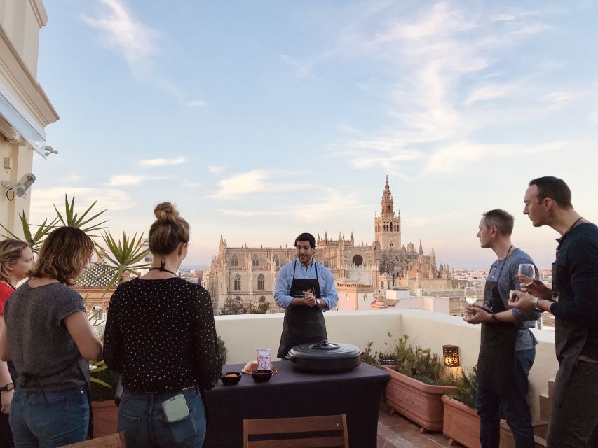 Seville: Highlights Rooftop Tour & Paella Cooking Class - Common questions