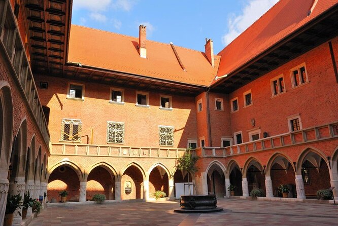 A Glance at the Krakow Old Town From the Deck of a Electric Golf Cart - Key Points