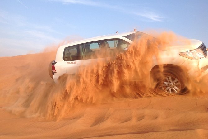 Abu Dhabi Desert Safari With BBQ, Camel Ride, and Arabian Show - Key Points