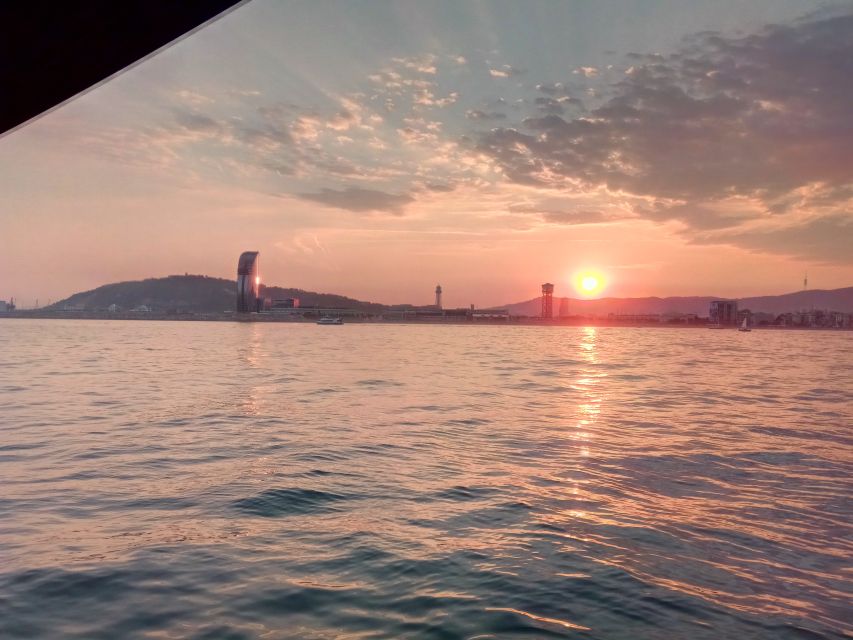 Barcelona: Sunset Sailing Tour With Open Bar & Snacks - Key Points