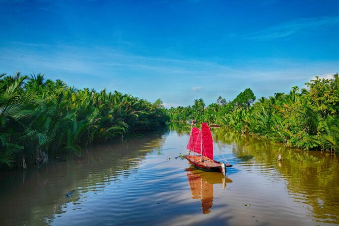 Ben Tre Half Day Tour With Scooter and Sailboat and Mekong Food - Key Points