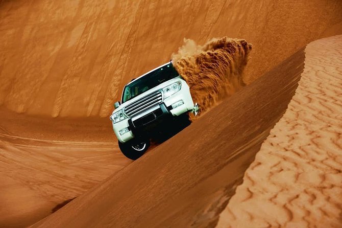 Dubai Desert Dune and Camel Riding Safari With BBQ Dinner - Key Points