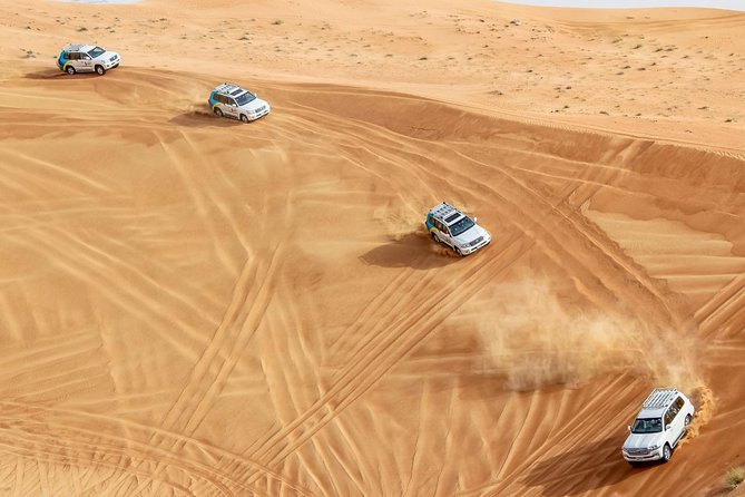 Dubai Desert Safari via 4×4 With Camel Farm, Sandboarding