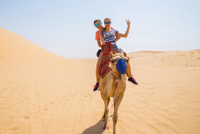 Evening Red Dunes Desert Safari Dubai With Sanboarding Camel Ride & BBQ - Key Points