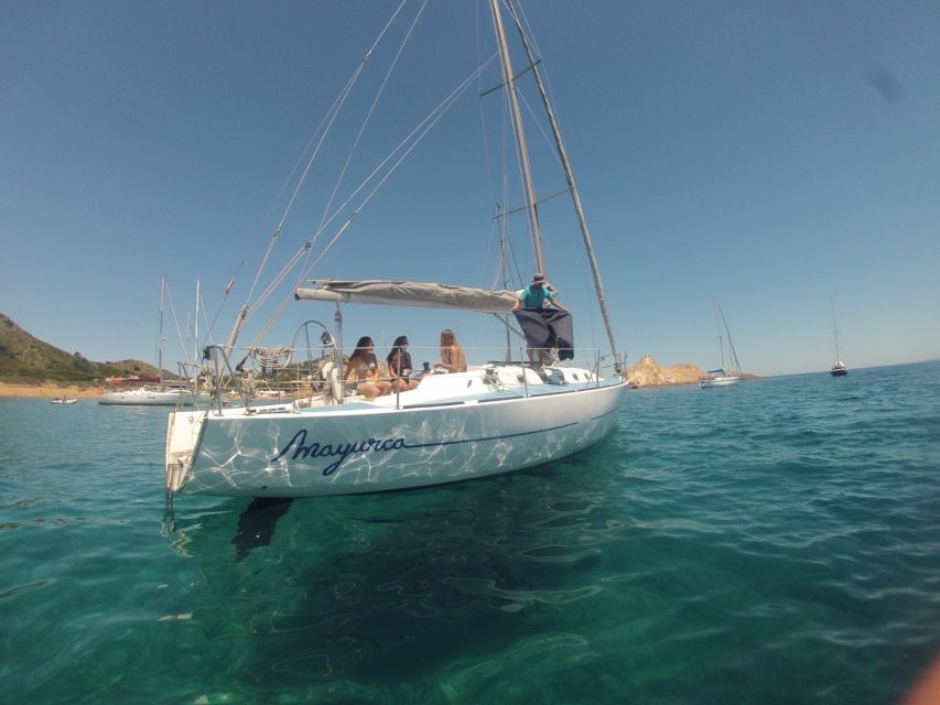 fornells bay sunset sailing trip by sailboat Fornells Bay: Sunset Sailing Trip by Sailboat