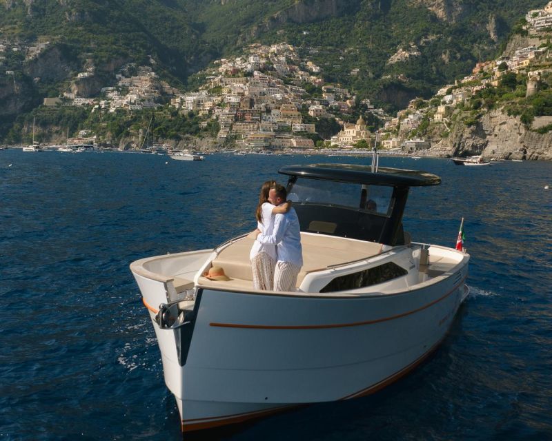 from positano private tour to capri on a gozzo boat From Positano: Private Tour to Capri on a Gozzo Boat