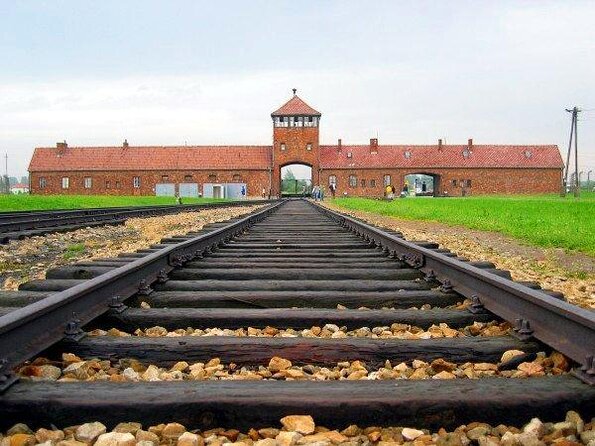 From Warsaw: Auschwitz-Birkenau Tour With Premium Train Transportation - Key Points