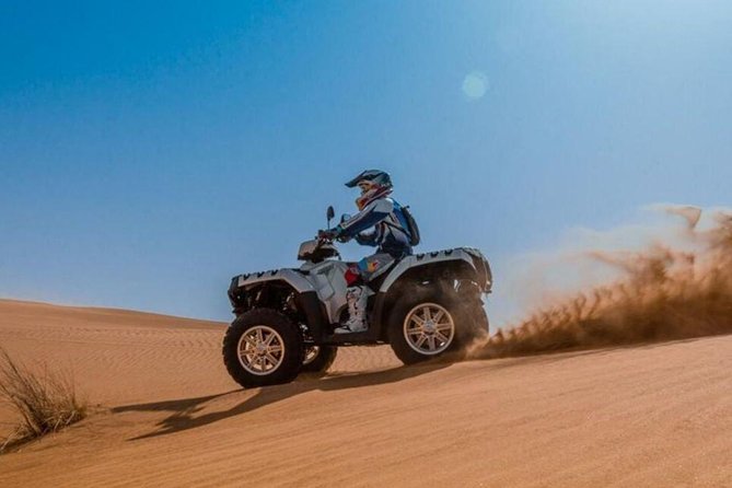 Half-Day Quad Bike Tour in Dubai Dunes With Camel Ride - Key Points