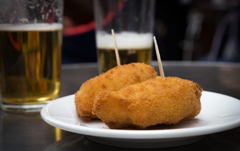 Madrid: Authentic Tapas Evening Tour With a Side of History - Key Points
