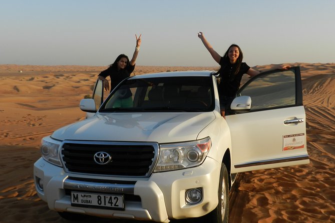 Morning Red Dunes Desert Safari With Camel Ride And Sand Boarding - Key Points