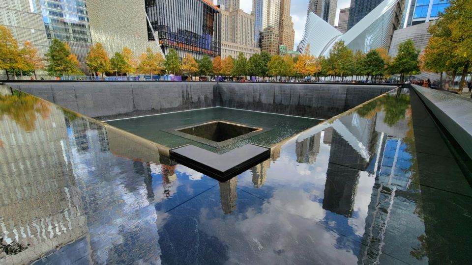 NYC: 9/11 Memorial and Financial District Walking Tour - Experience the 9/11 Memorial