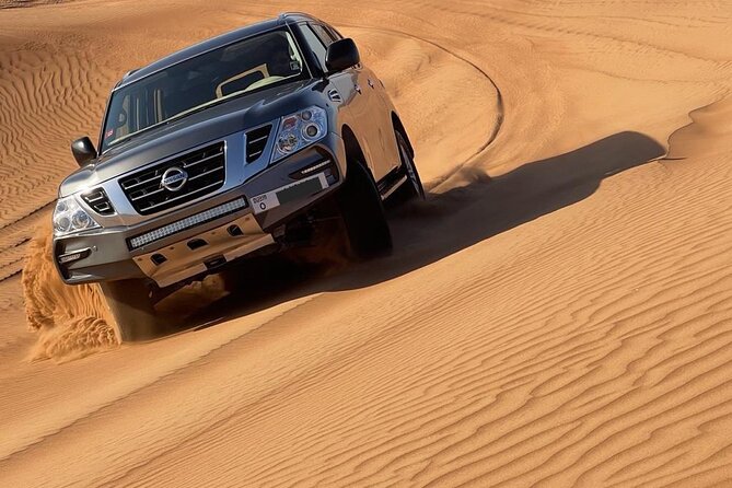 Private Afternoon Desert Safari With Quad Bike, Camel Ride and Sandboarding - Key Points