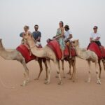 private overnight safari sandboarding camel ride bbq dinner and belly dancing Private Overnight Safari: Sandboarding, Camel Ride, BBQ Dinner and Belly Dancing