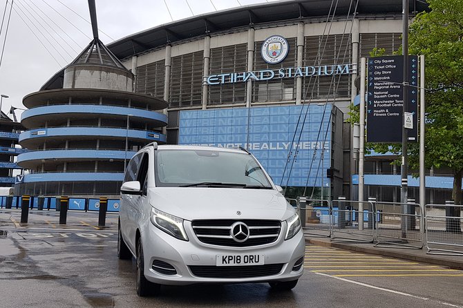 Private Round-Trip Transfer From Manchester Airport to Etihad Stadium - Key Points