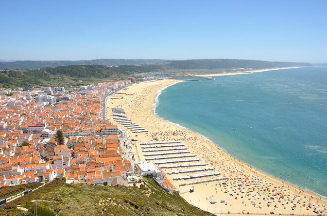 Private Tour: Discovery Fishing Village of Nazaré and the Giant Waves With Traditional Lunch - Key Points