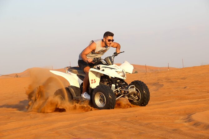 Red Dune Bashing With Quad Bike Sandboard Camel Ride & BBQ Dinner - Key Points