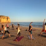 revitalizing beach yoga in portimao by el sol lifestyle Revitalizing Beach Yoga in Portimao by El Sol Lifestyle