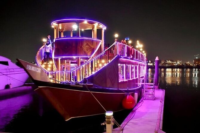 Romantic Dubai Water Canal Cruise With Live Shows and International Buffet - Key Points