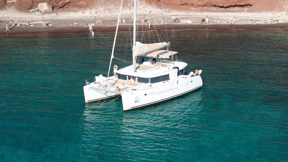 Santorini Catamaran Day Cruise: Lunch, Drinks and Transfers - Key Points