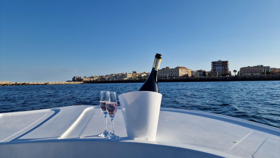 Siracusa:Ortigia & Sea Caves Boat Tour and Apertif at Sunset - Key Points
