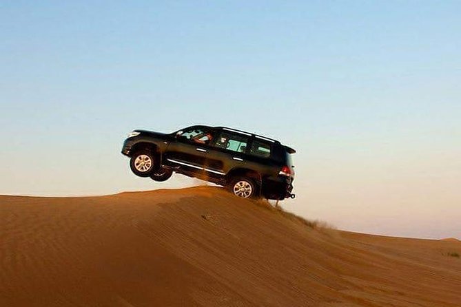 Sunset Desert Safari Dubai With Belly Dance & BBQ Dinner - Key Points